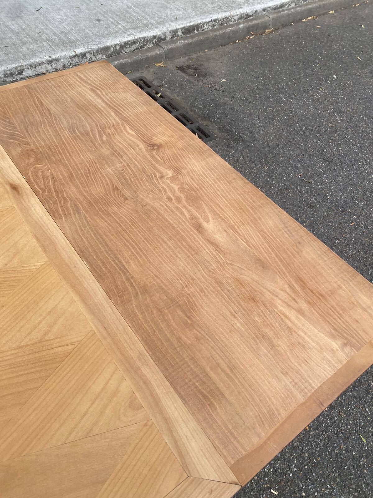 Renovated 1950s wooden Art Deco extendable dining table.