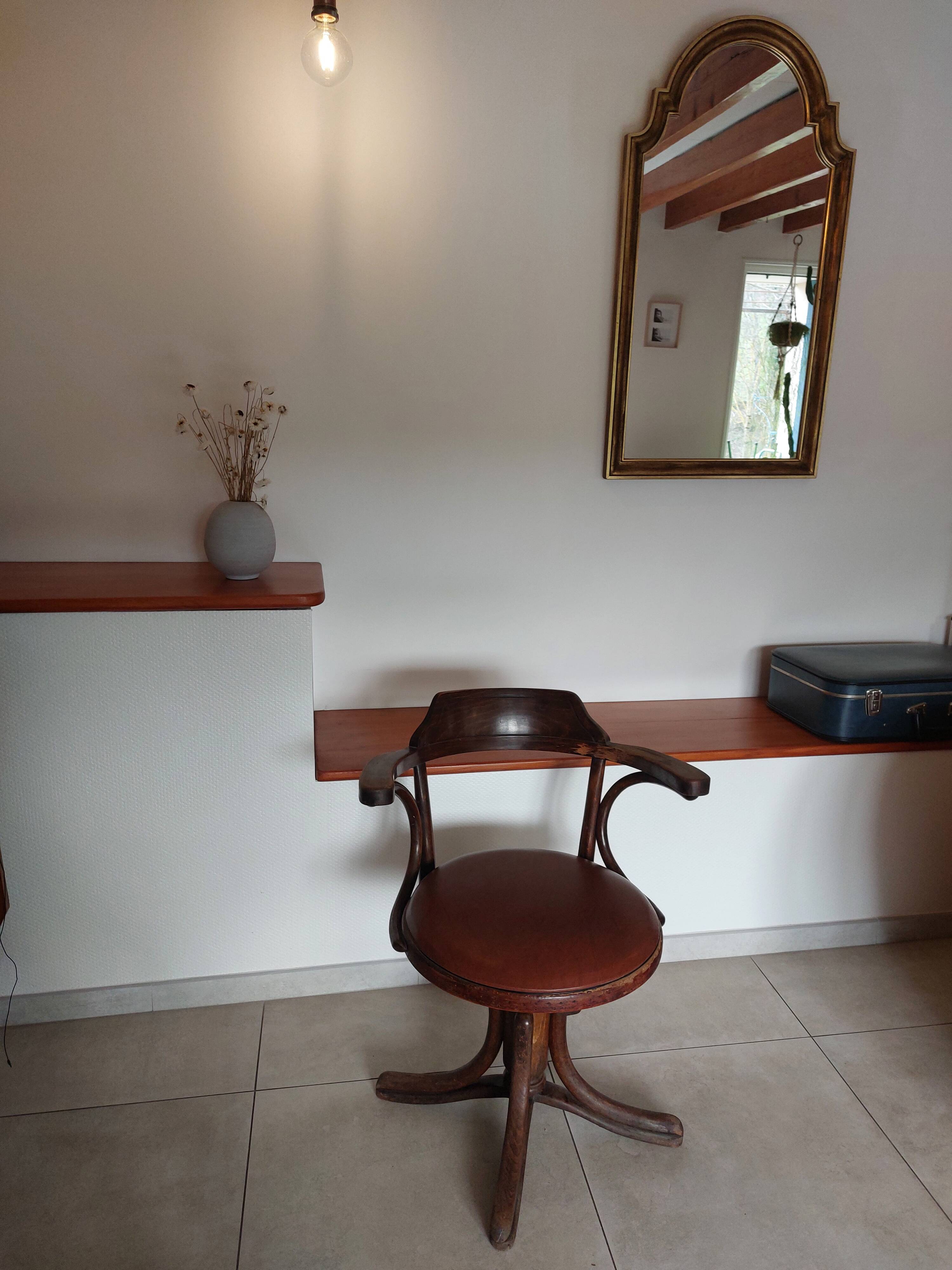 Thonet armchair, swivel, in wood and faux leather.