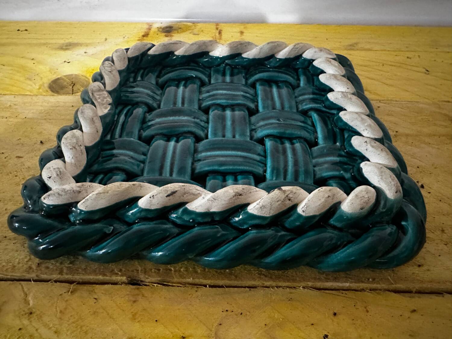 Woven ceramic trivet from Vallauris in the Massier style.