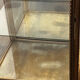 Counter display cabinet in wood and glass in Louis XVI style, 19th century.