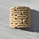 Handcrafted ceramic wall light in raw stoneware inspired by Mid Century design.
