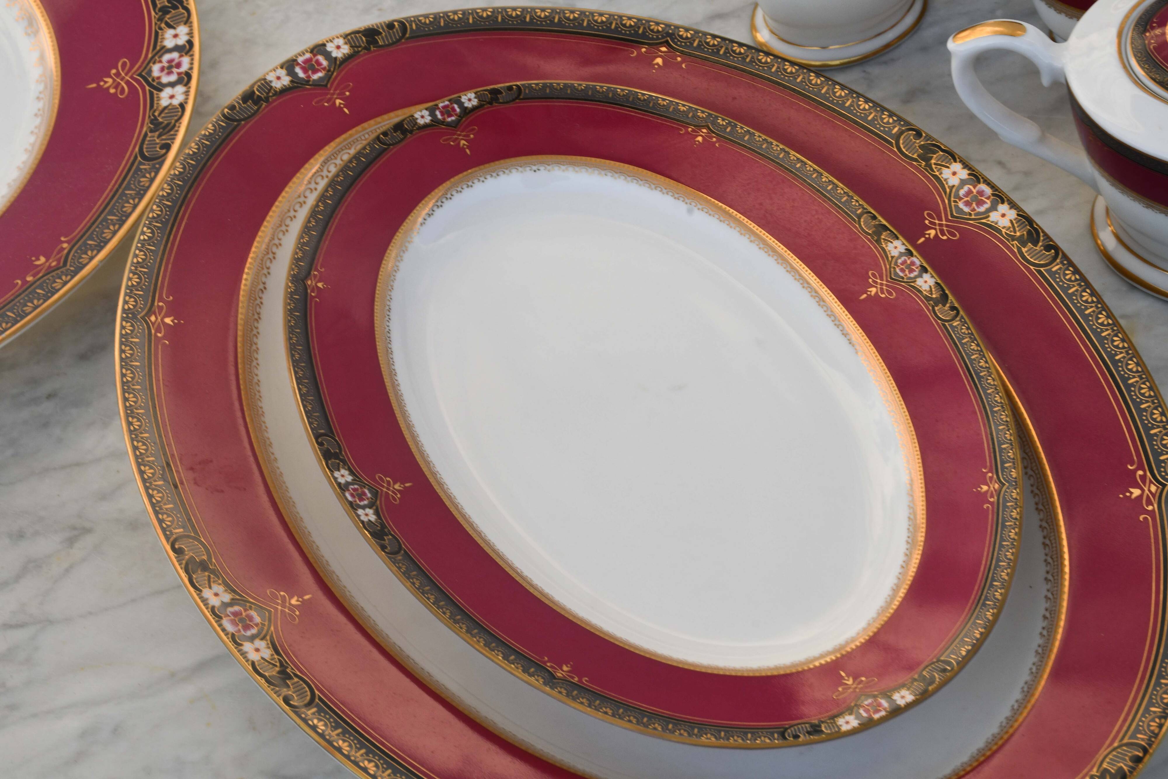 Elegant mid-century Japanese bone china service for 12 in white and noble red