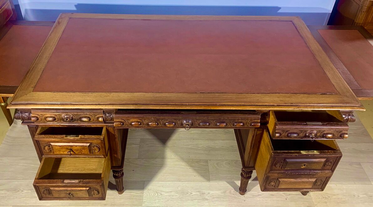 Renaissance style desk in solid oak, richly carved