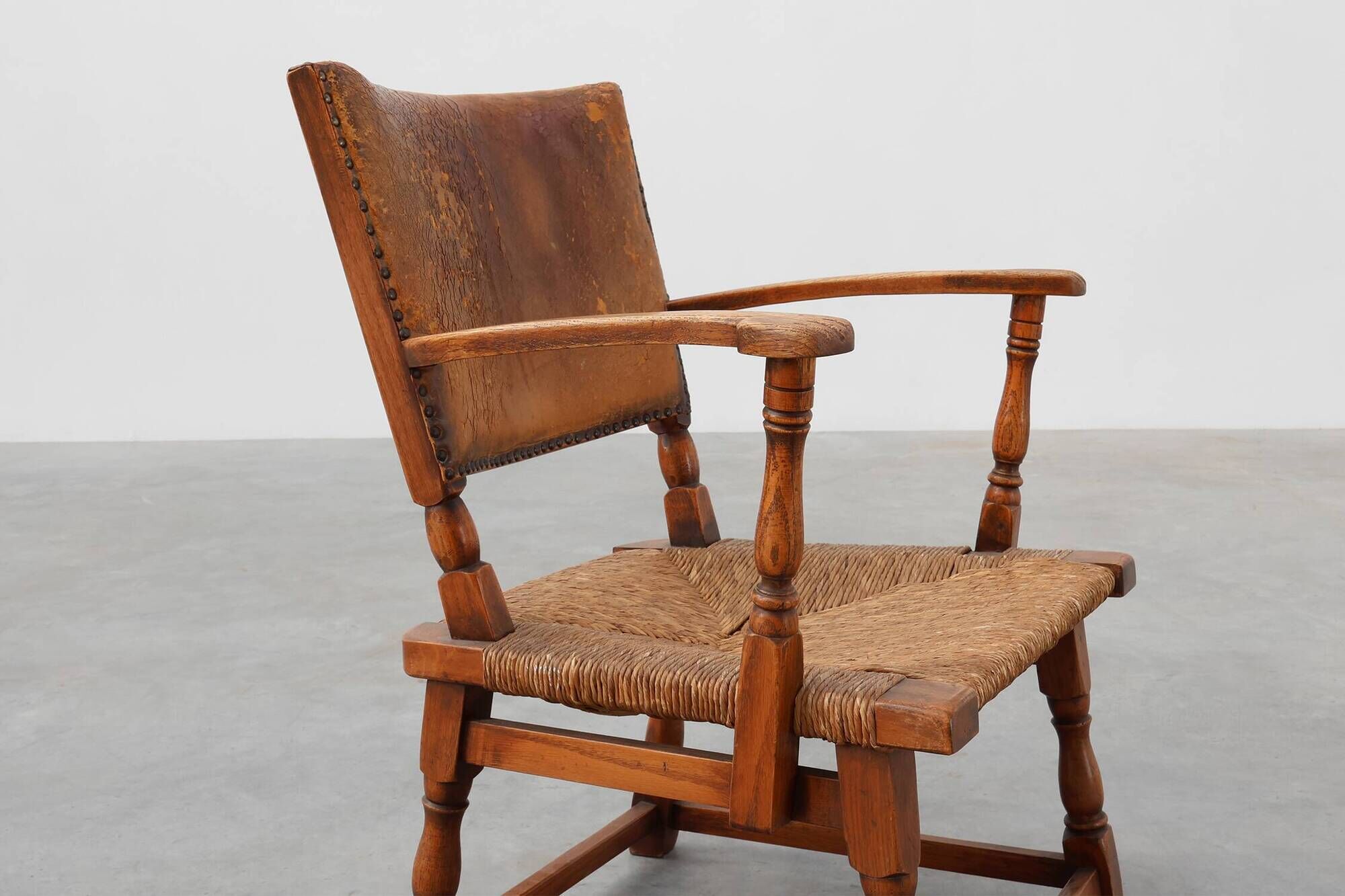 Leather and oak Armchair by Theo Ruth for Artifort, The Netherlands 1940s