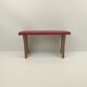 Footrests in wood and pink velvet