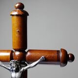 Antique wooden altar crucifix with a turned design and silver-plated Christ.