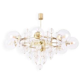 Large chandelier in gilded brass with decorative balls. 1970s.