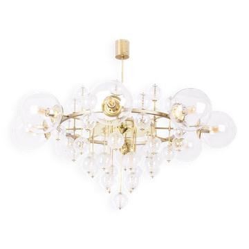 Large chandelier in gilded brass with decorative balls. 1970s.