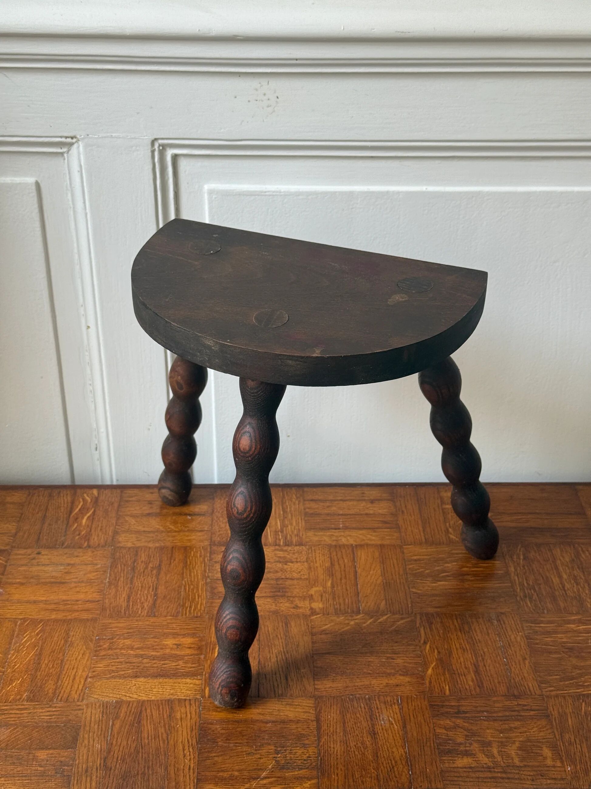 Three-legged turned wooden stool