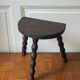 Three-legged turned wooden stool