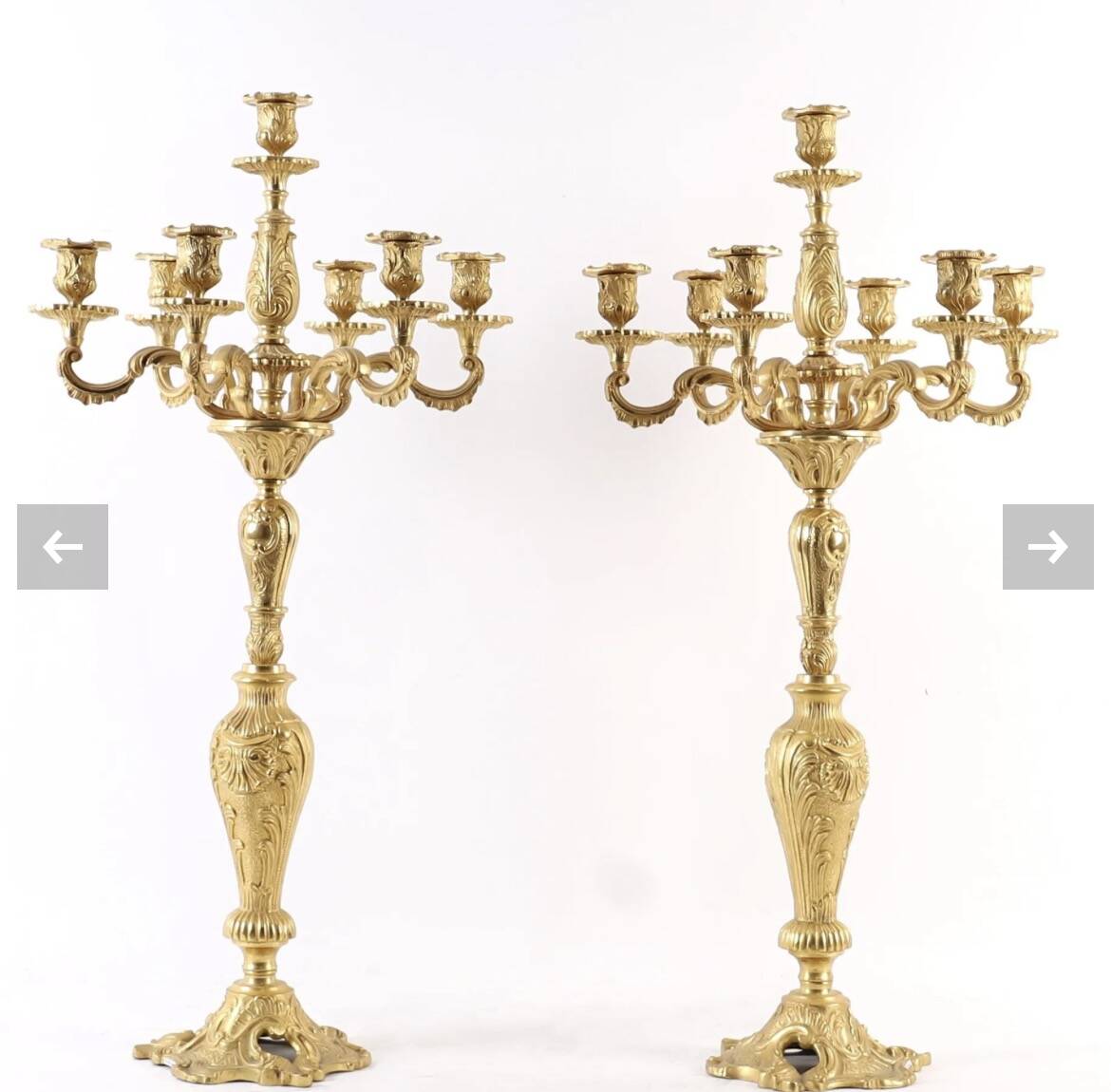 Pair of candelabra, in Louis XV style, in gilded bronze.