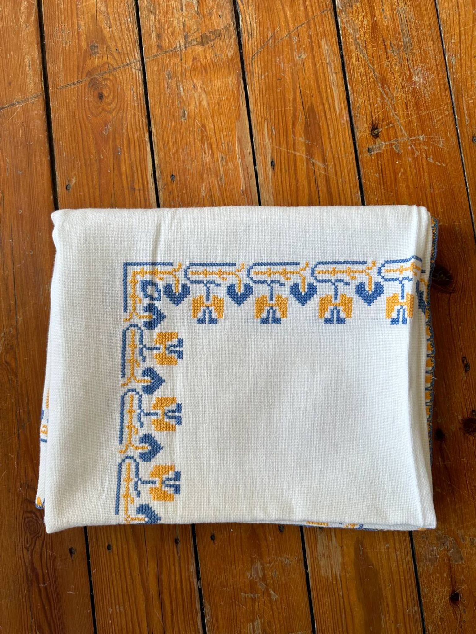 Embroidered white tablecloth