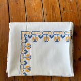 Embroidered white tablecloth