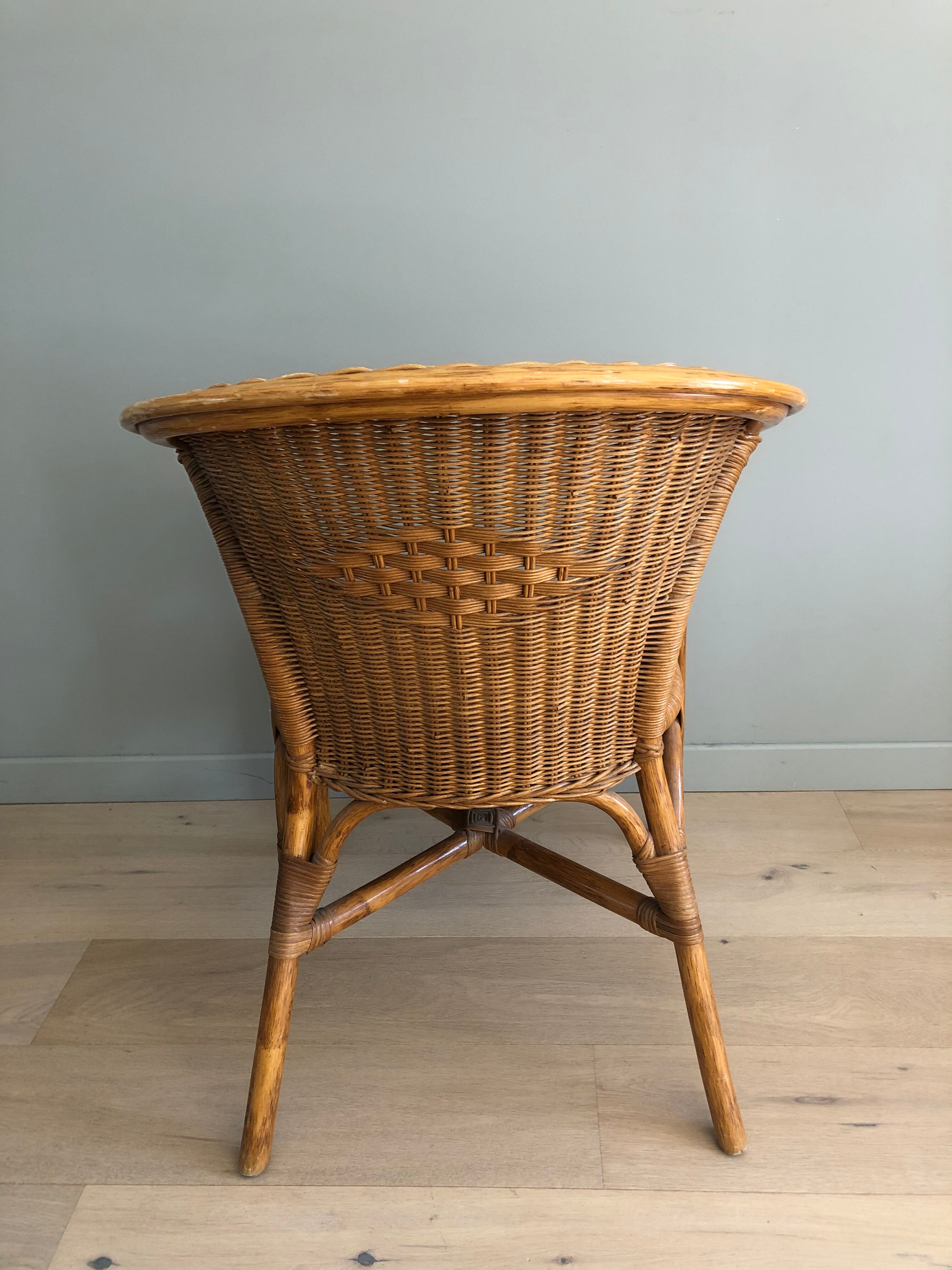 Pair of rattan armchairs from the 60s