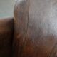 Beautiful vintage sheep leather armchair with a characterful appearance