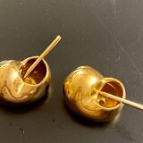 2 Snail-shaped salt pots in gold-colored porcelain
