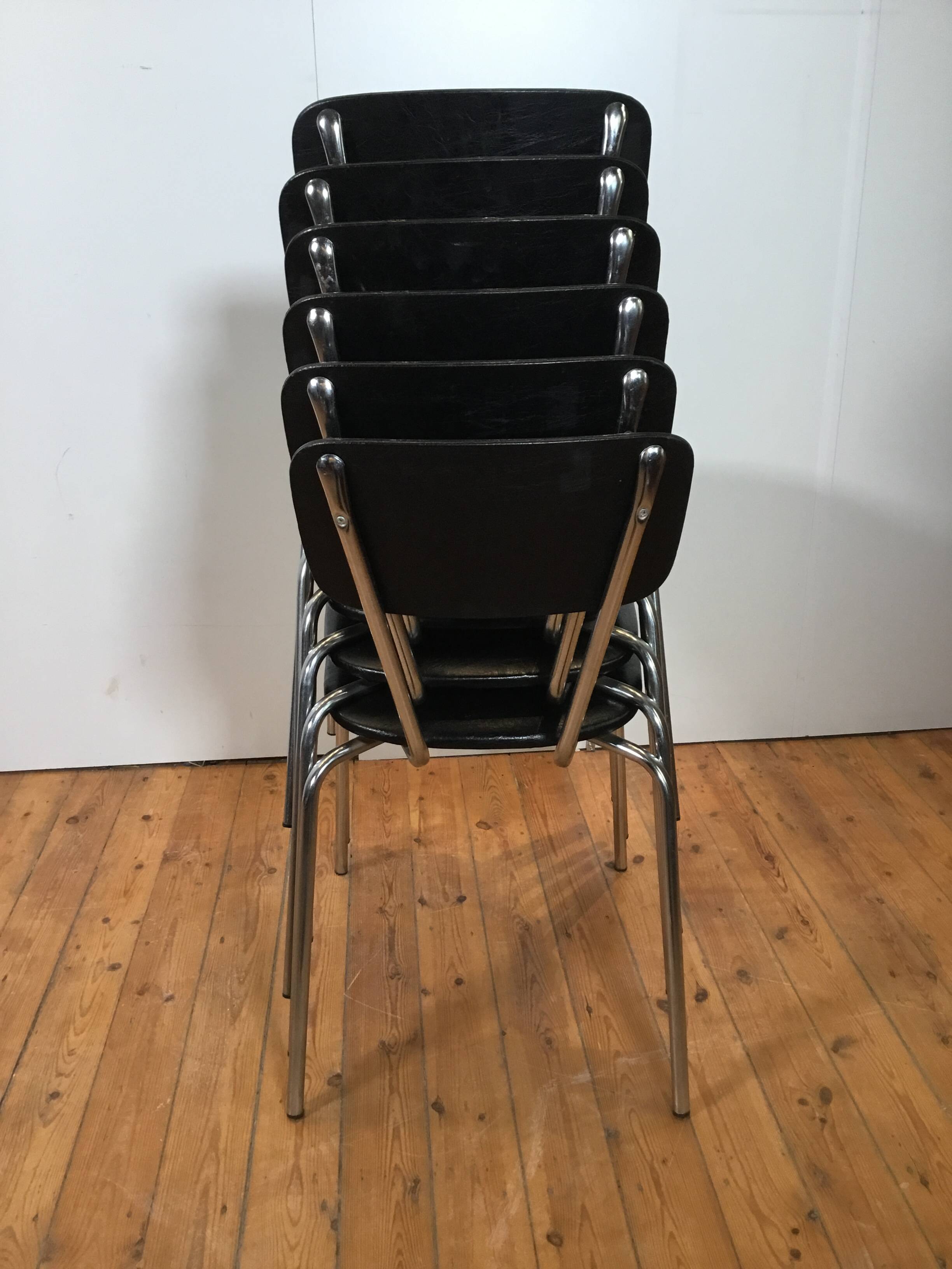 vintage chromed tubular steel stackable dining chairs