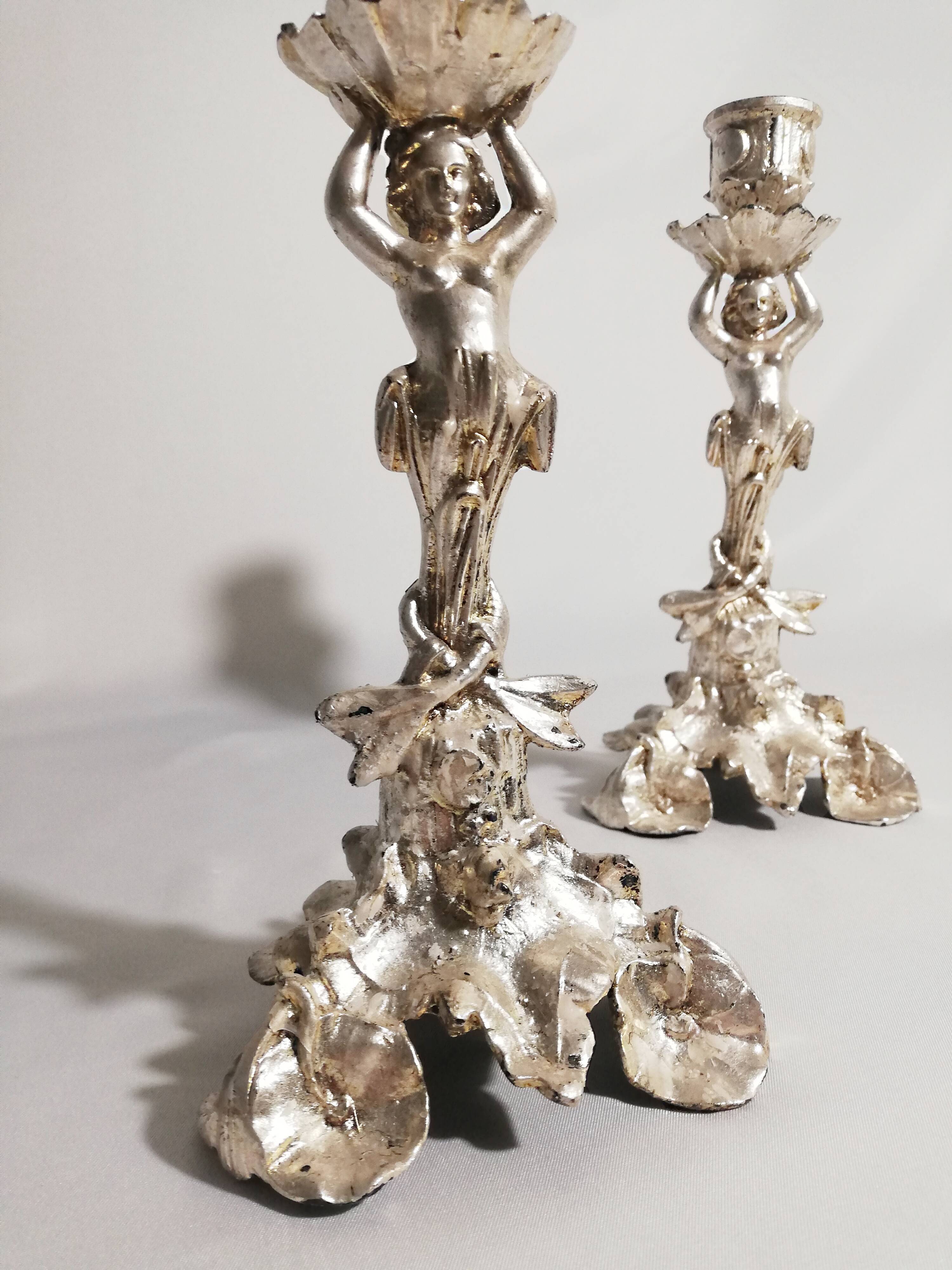 Pair of candlesticks restored to silver leaf