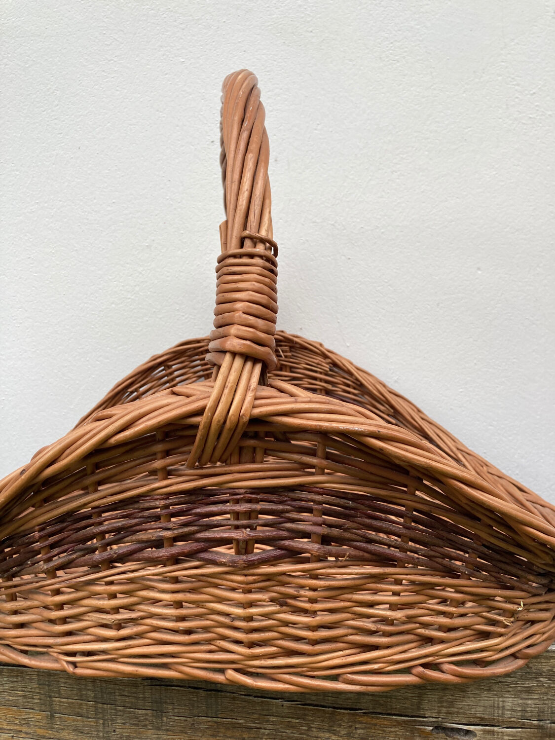 Large old woven wicker log basket