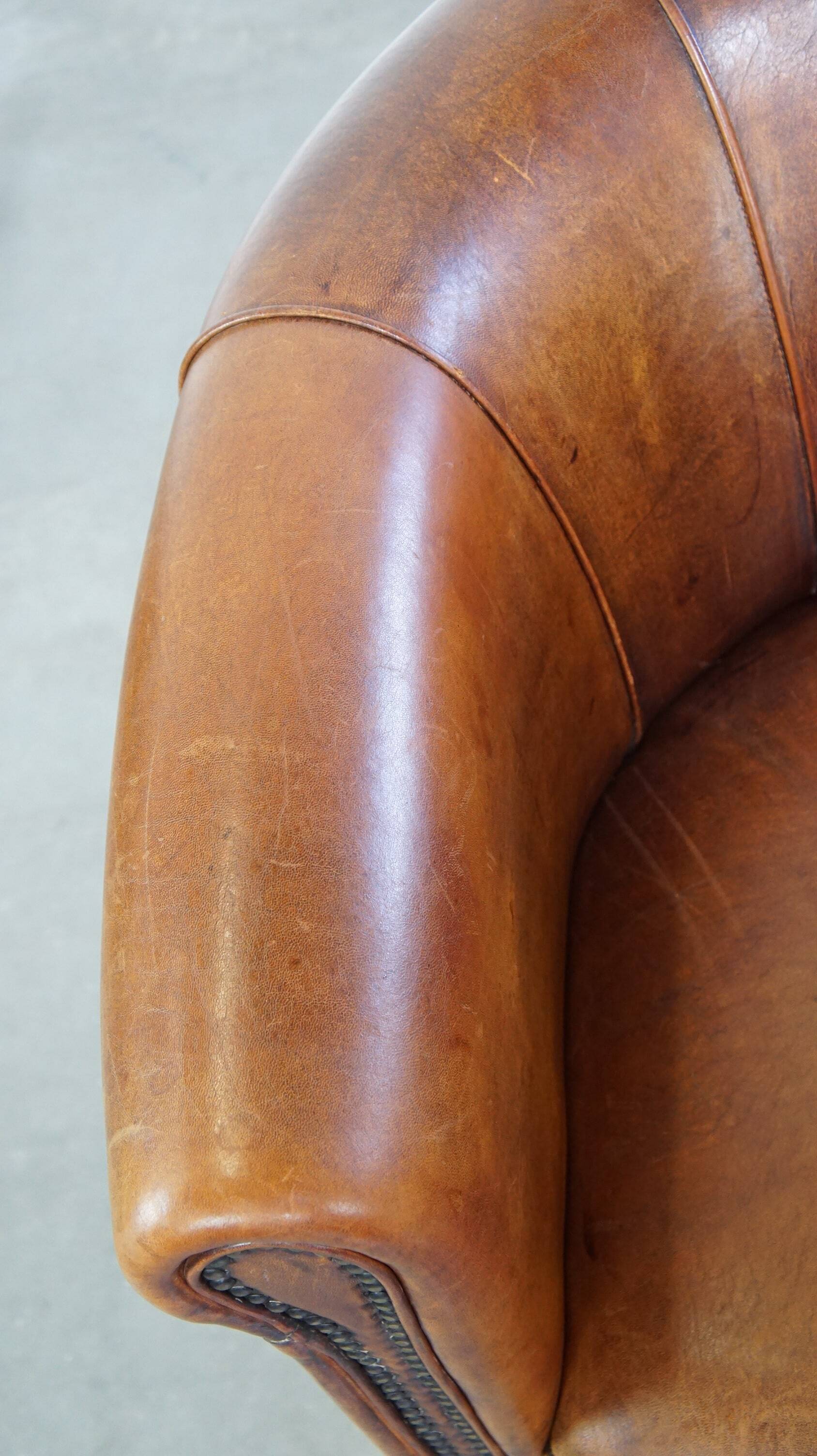 Brown leather club chair