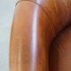 Brown leather club chair