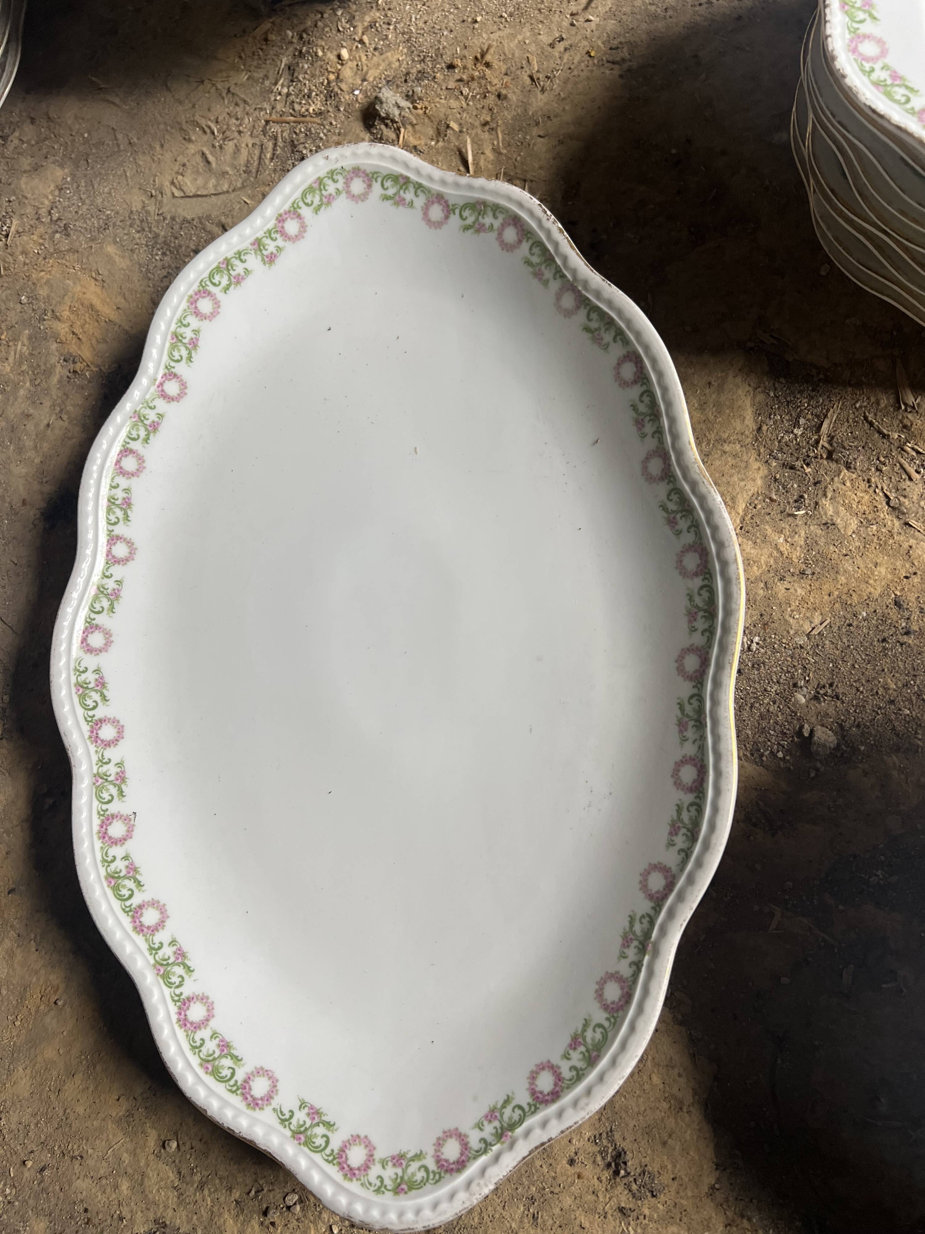 Large Limoges porcelain dinner service – floral decoration and gold trim