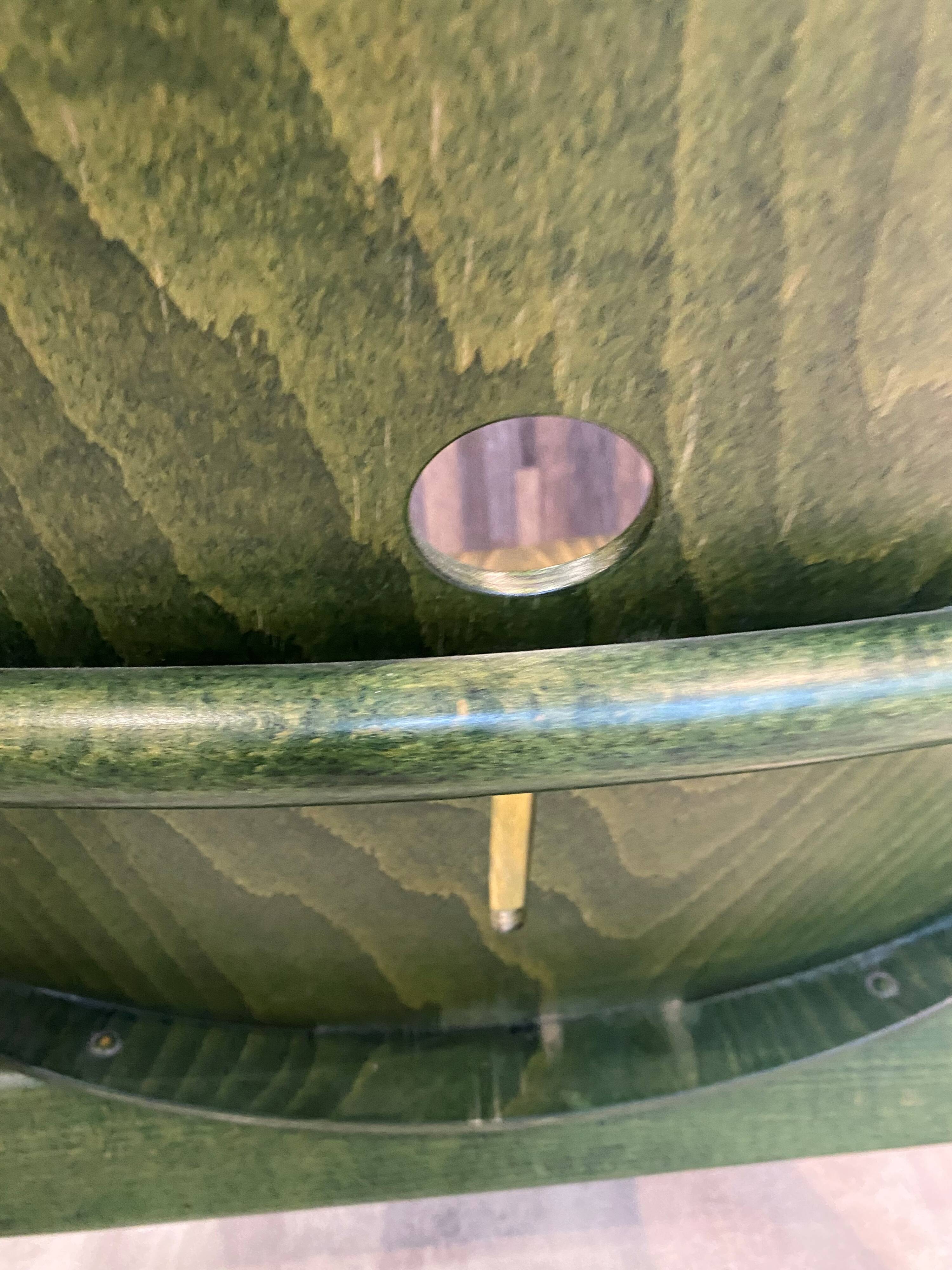 Fauteuil Baumann vert, années 70
