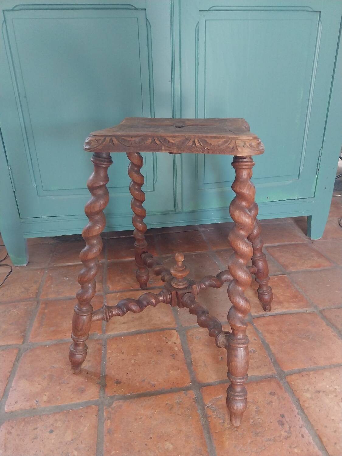Wooden stool with turned legs