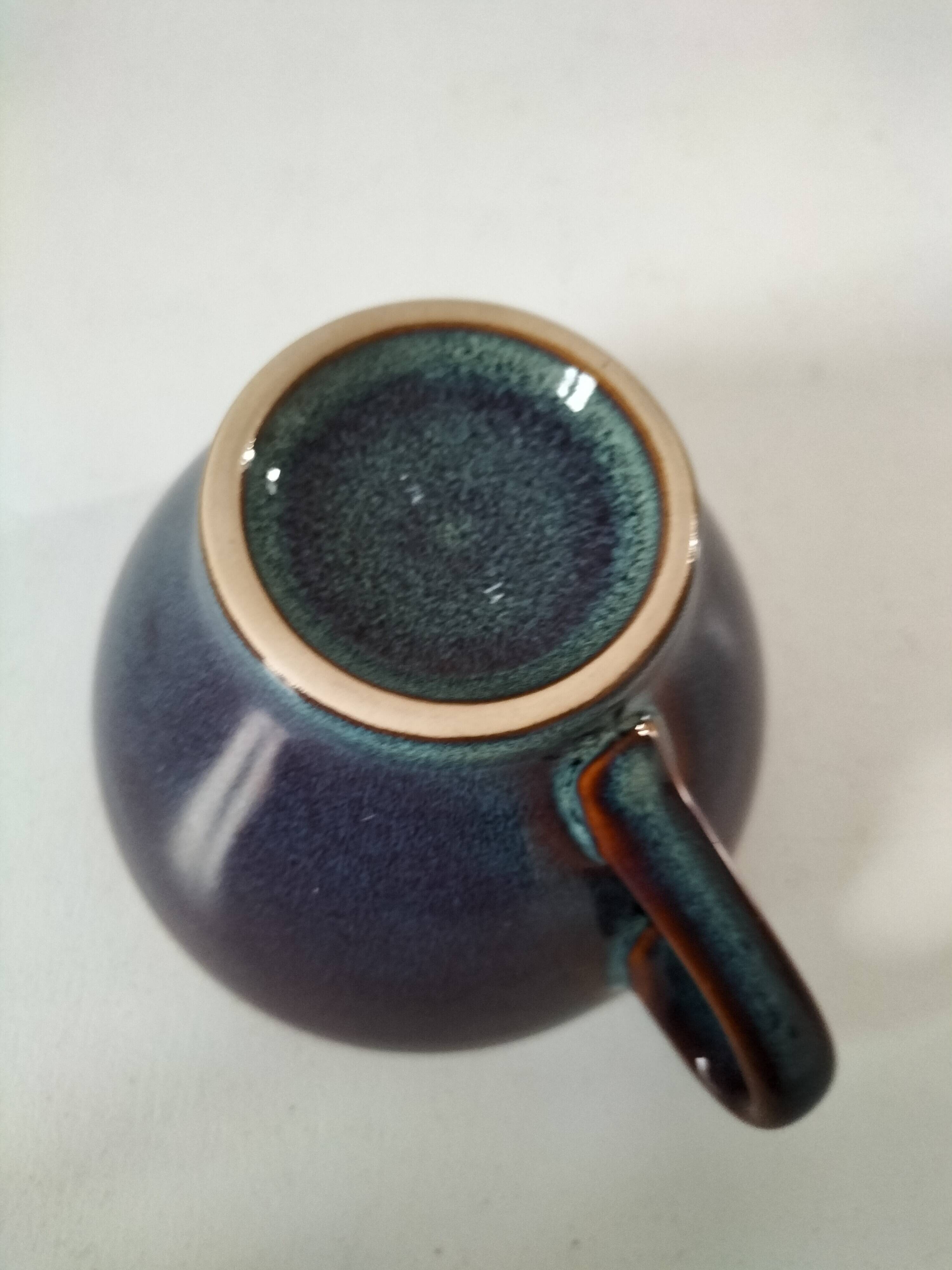 Speckled stoneware cup