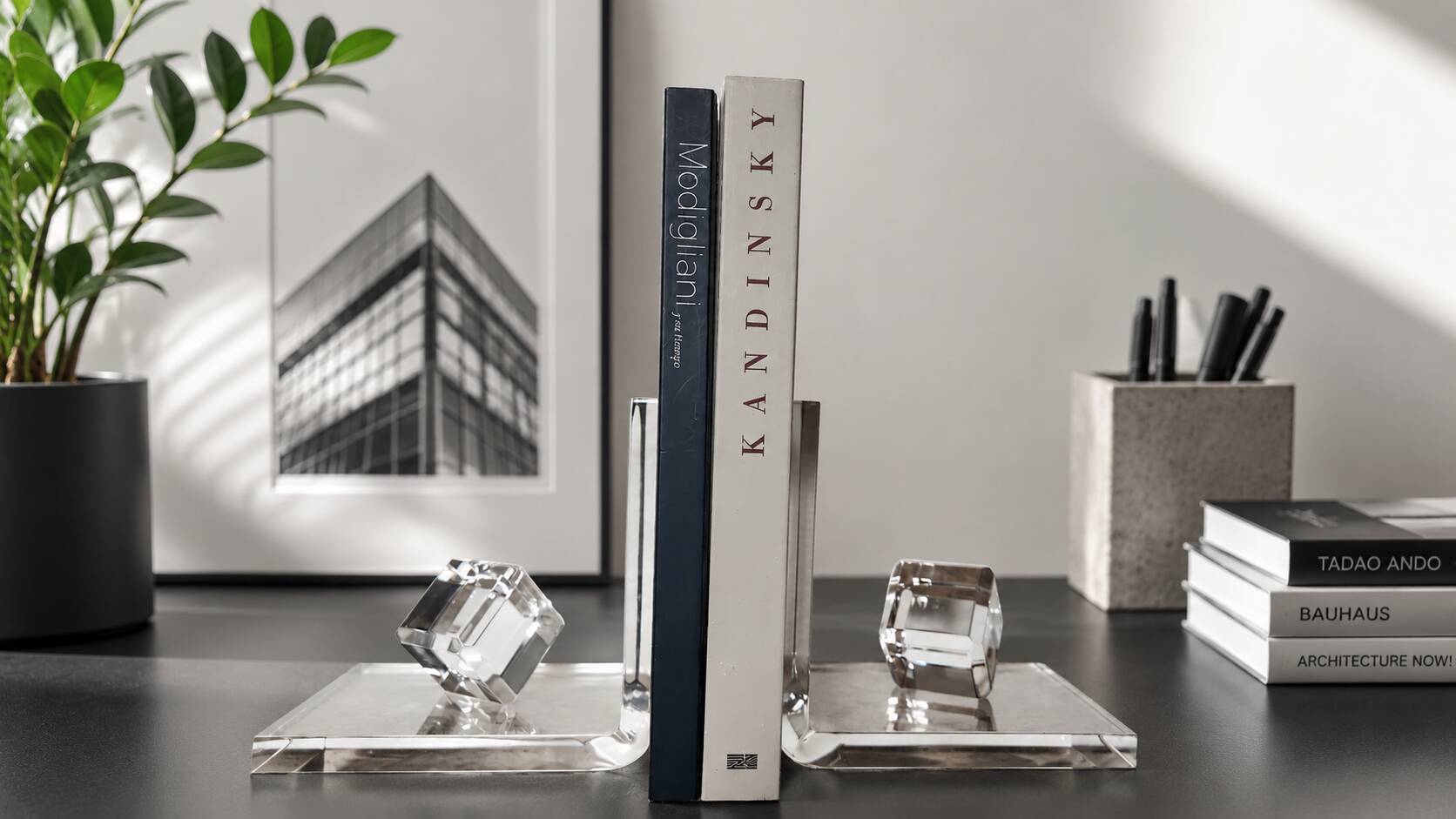 Pair of solid plexiglass bookends, faceted cubes, 1980s