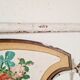 Cast-iron headboard and patinated white wood