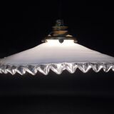 Suspension in corrugated opaline