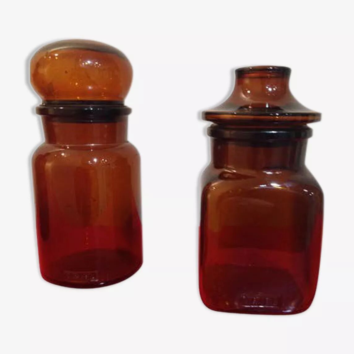 Pair of old amber glass jars