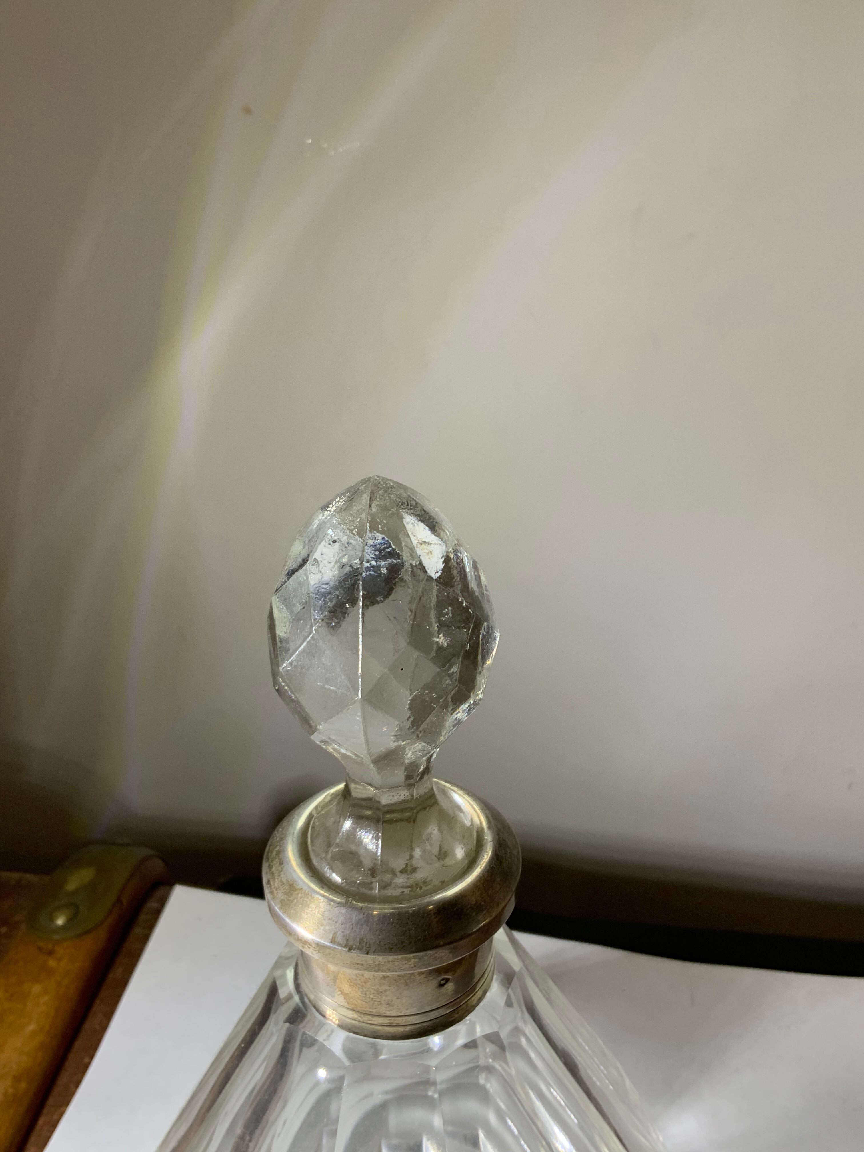 Antique crystal bottle with art deco hallmarked silver neck with facets