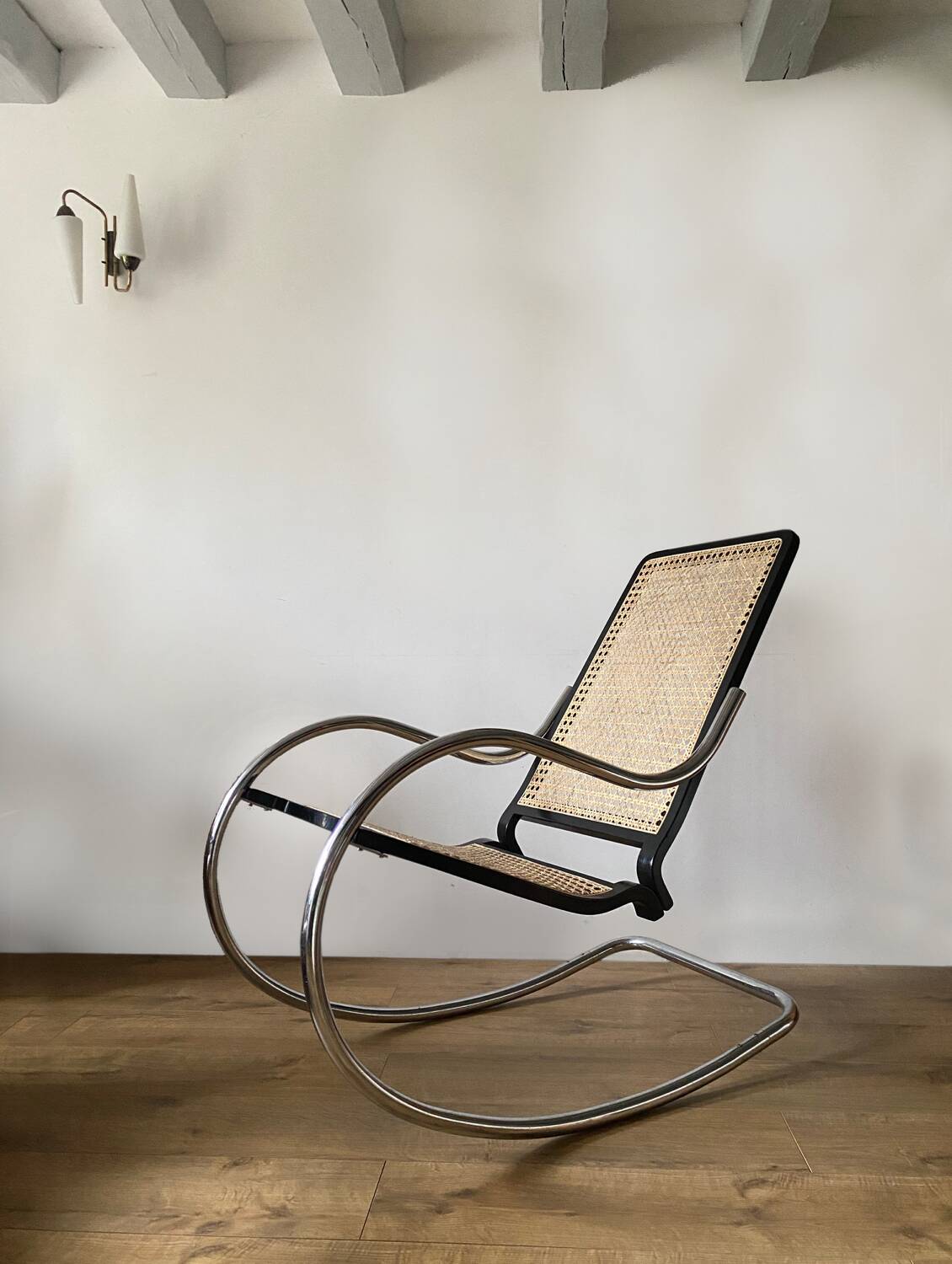 Chrome and cane rocking chair
