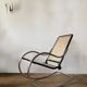 Chrome and cane rocking chair