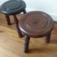 2 round tripod stools