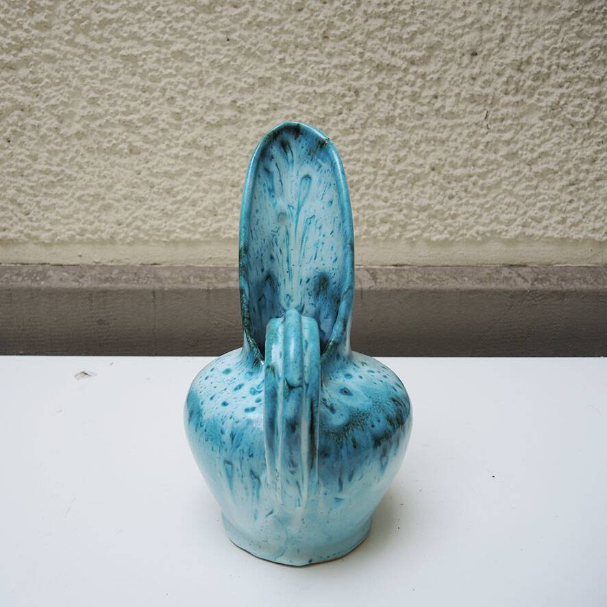 Old 'long spout' turquoise ceramic jug