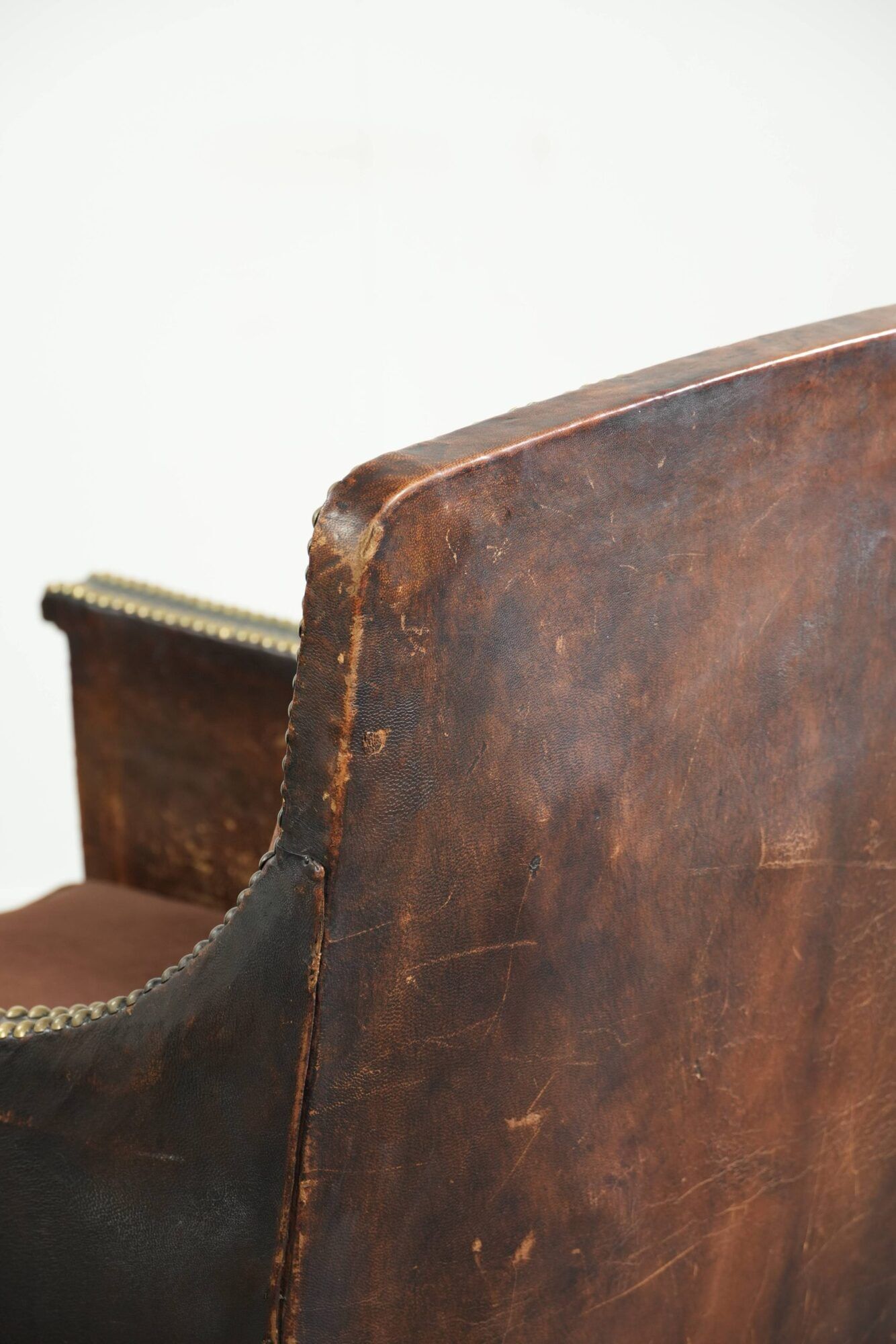 Art Deco design armchair finished in velvet and fitted with decorative nails