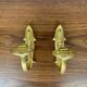 Pair of brass candle wall sconces, neoclassical style