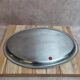 Vintage silver-plated metal tray with a segmented glass aperitif dish.