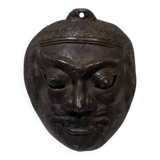 Ancient Indonesian bronze mask antique ethnic decoration tribal theater