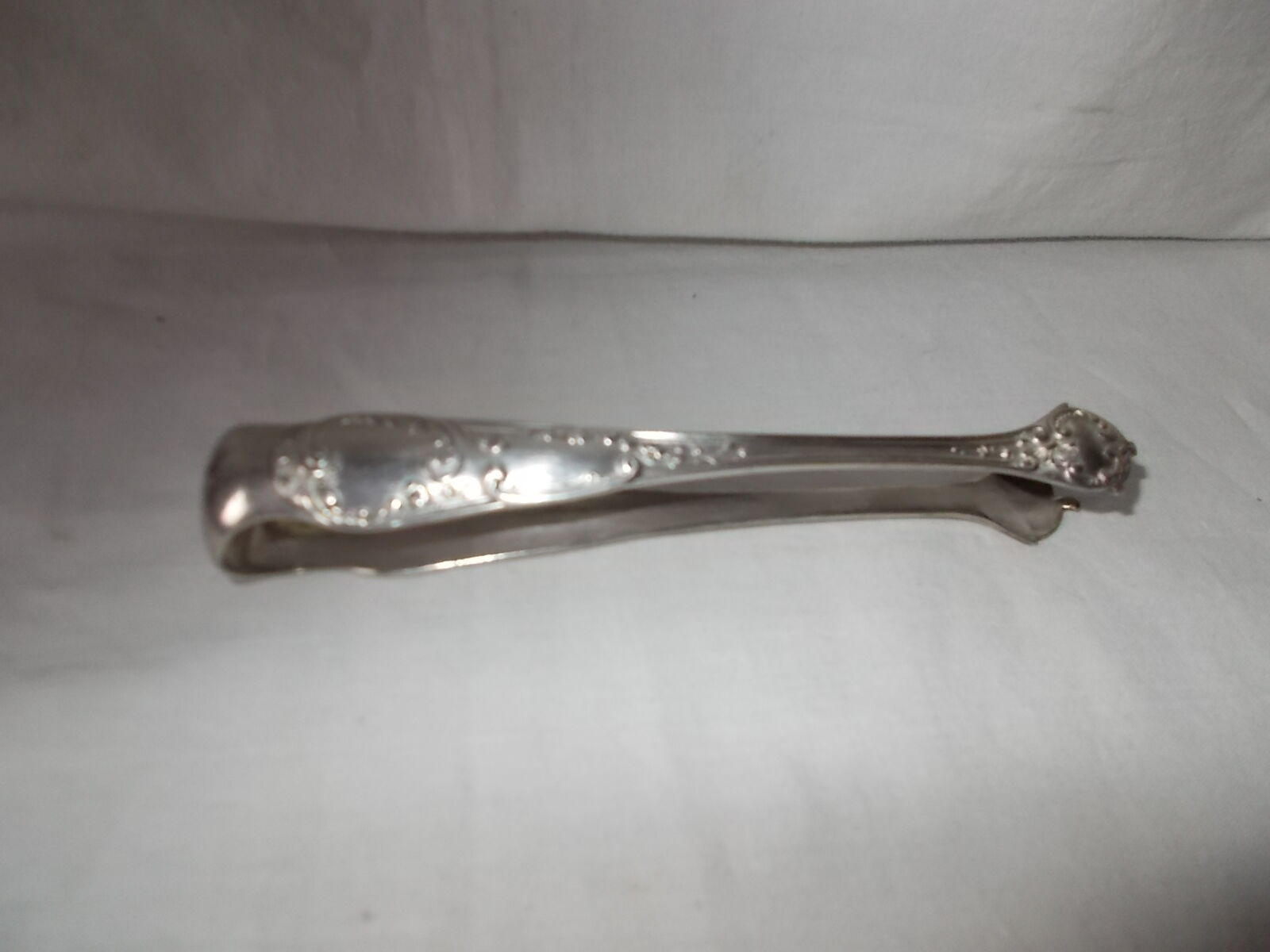 Silver metal sugar pinch