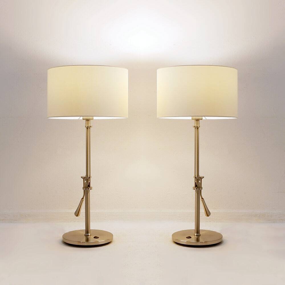 Pair of brushed steel table lamps with adjustable tilt - United Kingdom