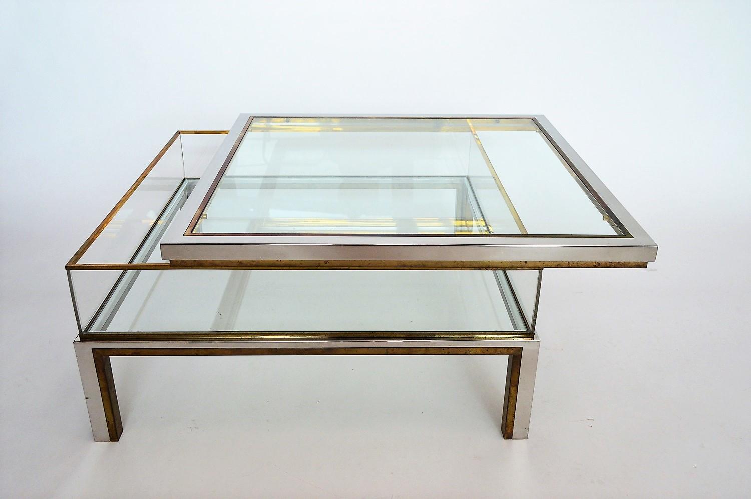 Coffee table in brass and chrome with folding top compartment to House Jansen 1970 s