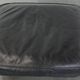Large and timeless black ottoman made of cowhide leather in English style