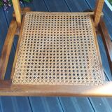 Folding beech cane armchair