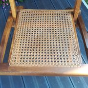 Folding beech cane armchair
