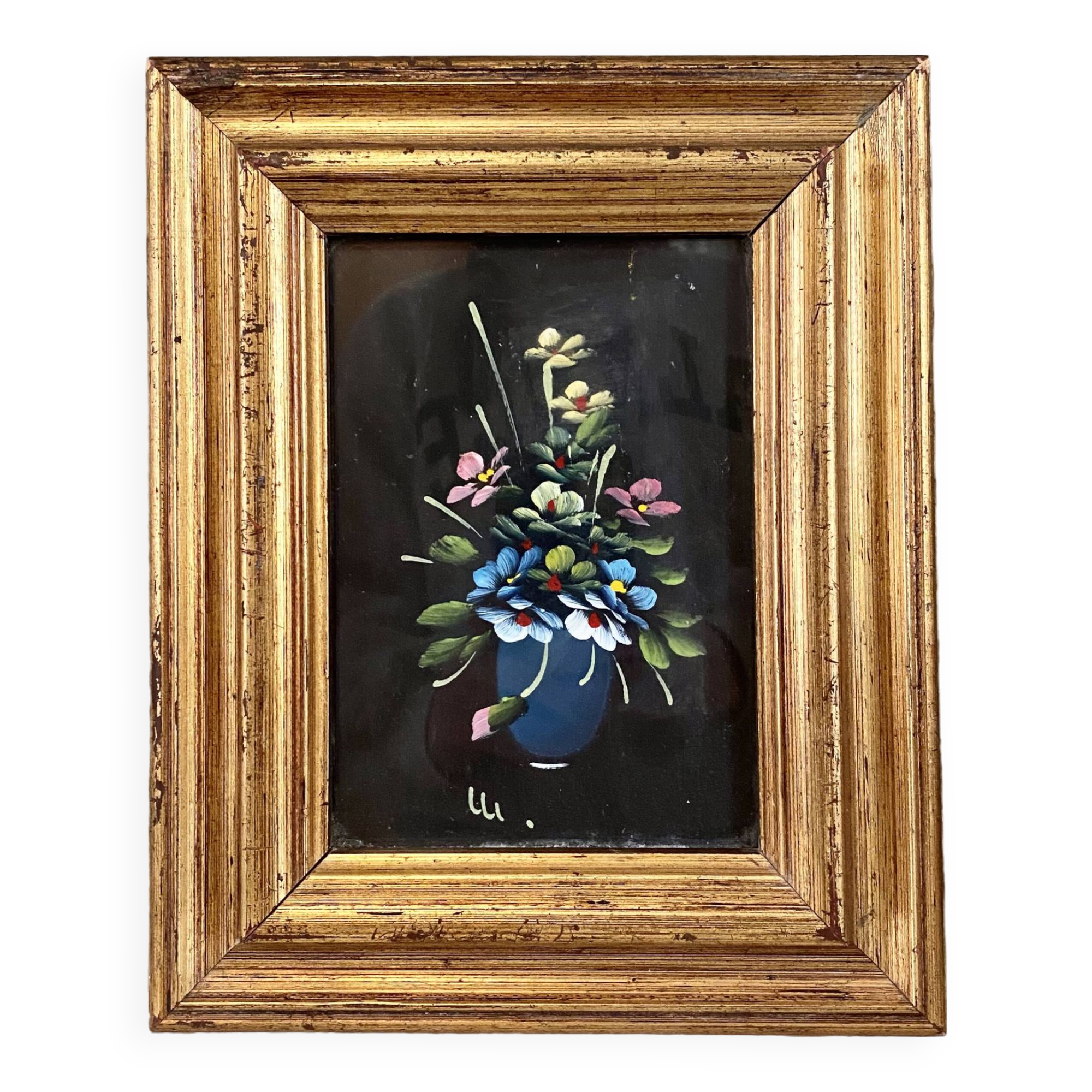 Golden frame with painting bouquet of flowers