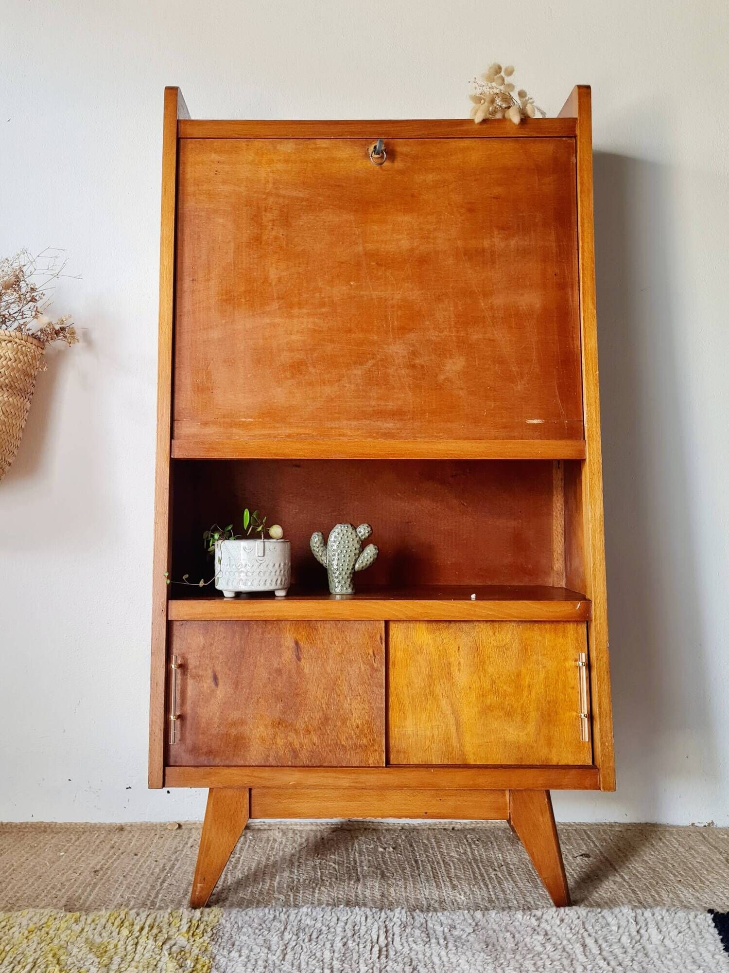 Vintage 1950s wooden secretary with tapered legs and mint interior.